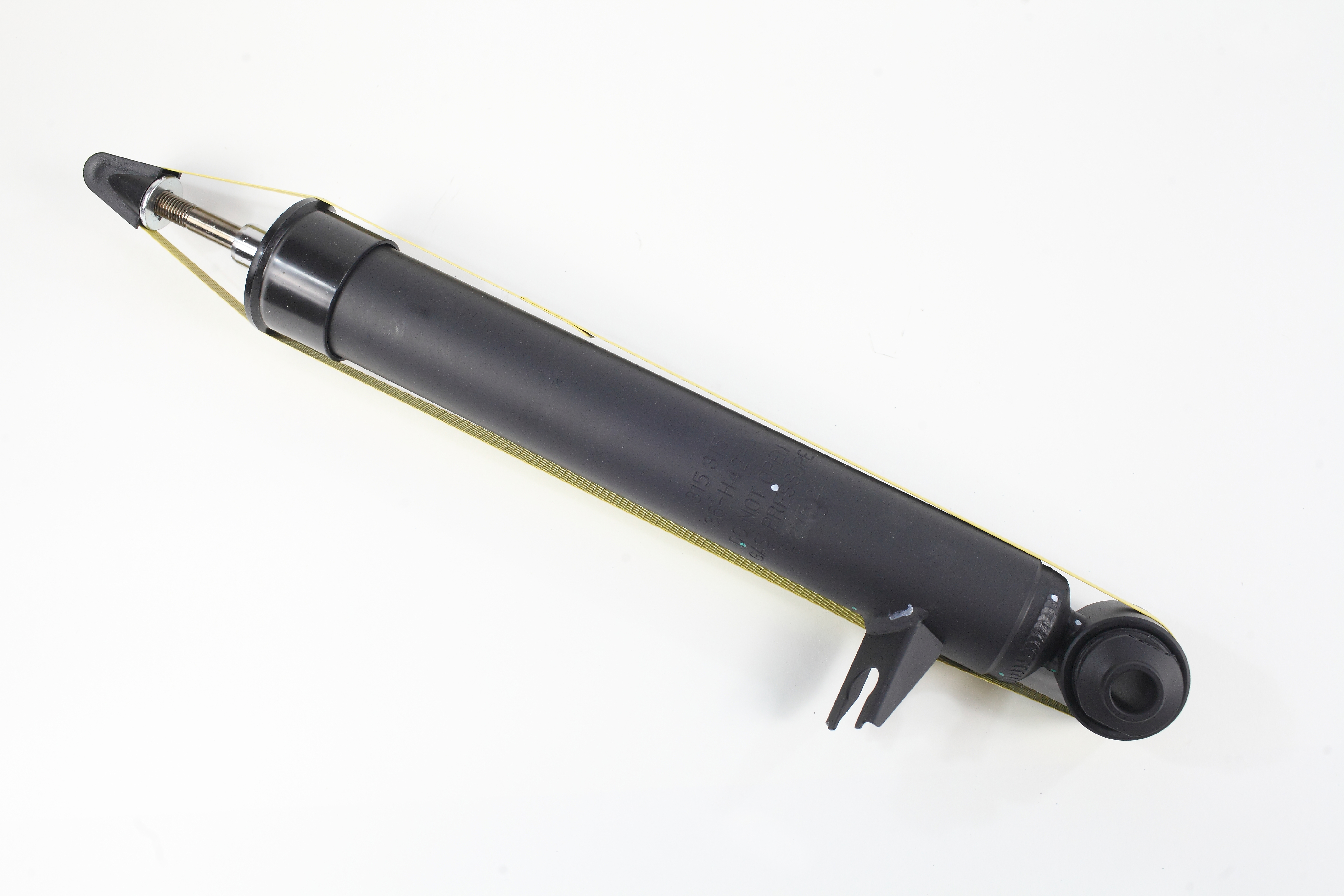 Амортизатор задний левый