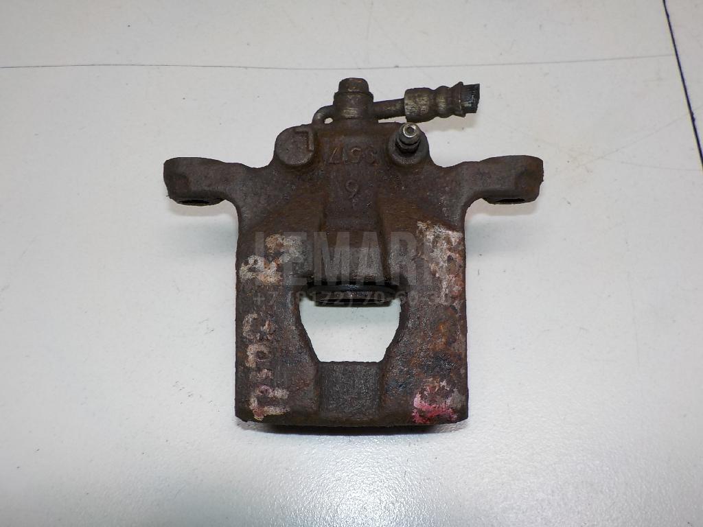 Суппорт тормозной задний правый 44001EM11A Nissan