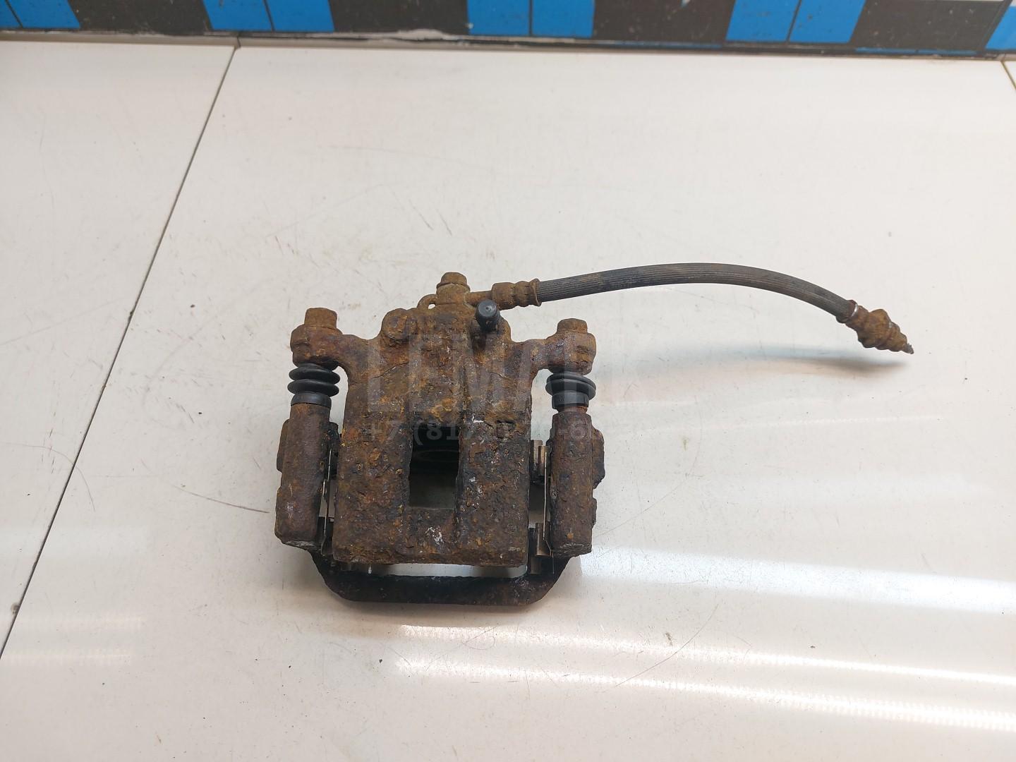 Суппорт тормозной задний правый 44001JG00A Nissan