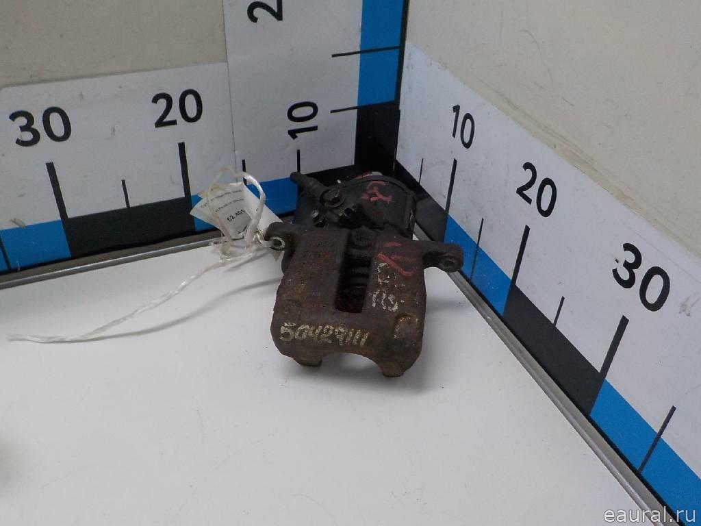 Суппорт тормозной задний правый