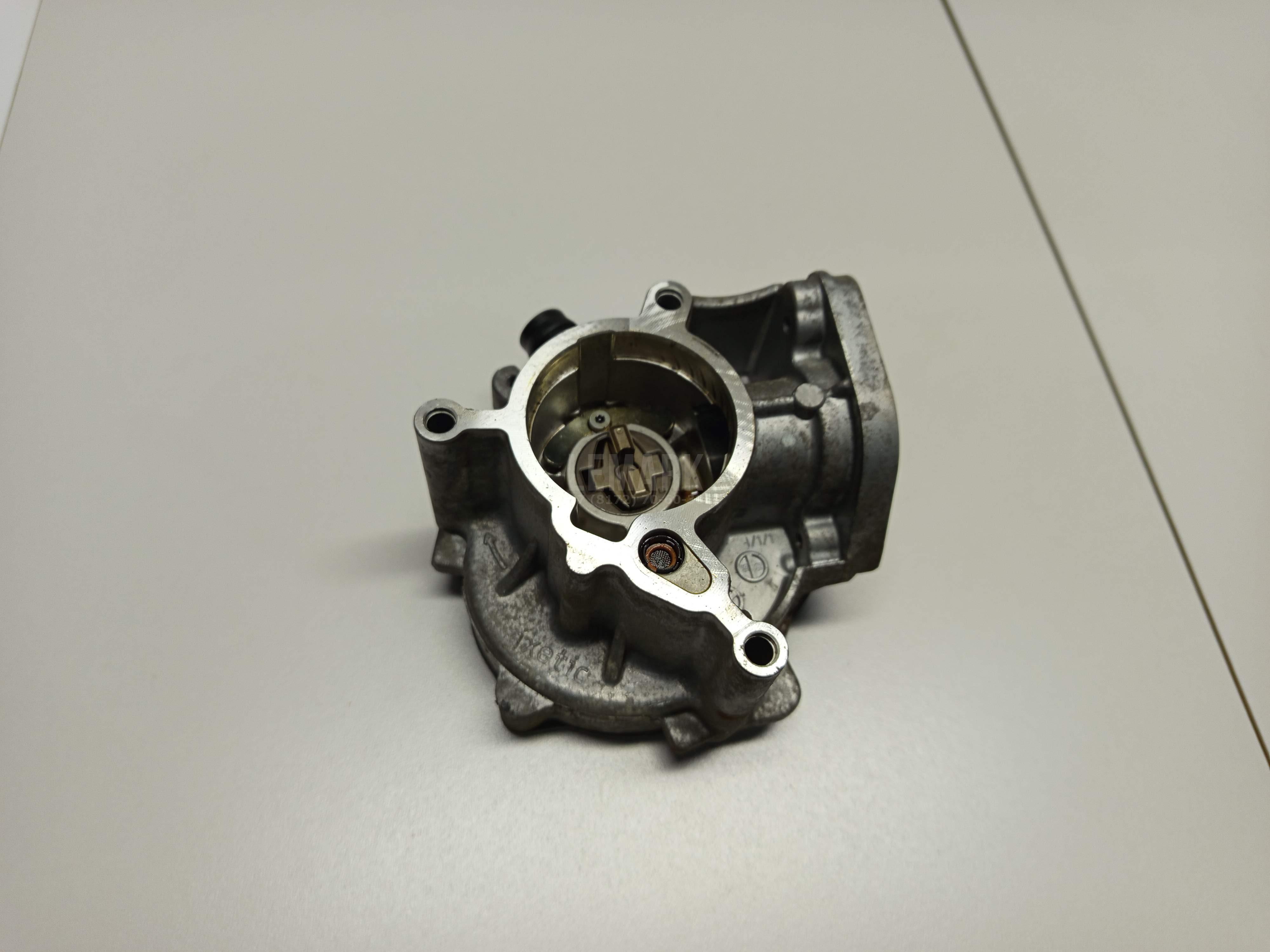 Насос вакуумный 06K145100B VAG