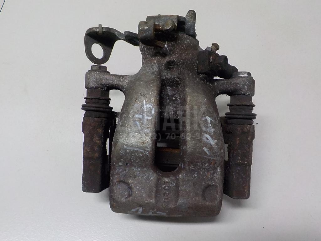 Суппорт тормозной задний правый 542127 GM