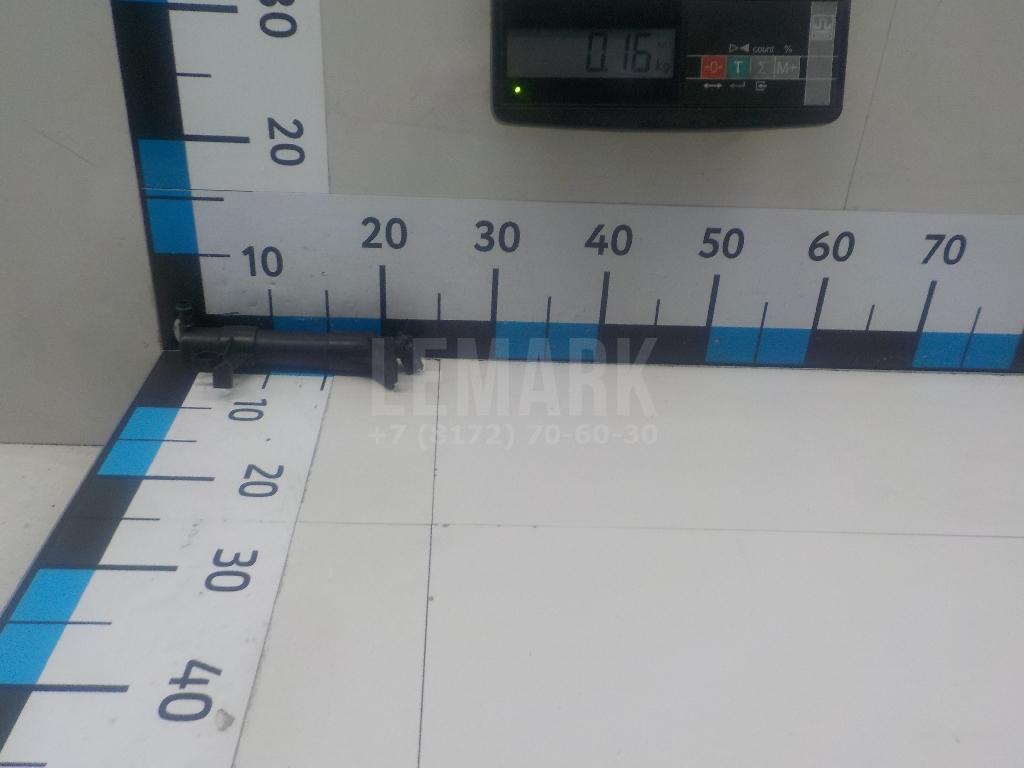 Форсунка омывателя фары