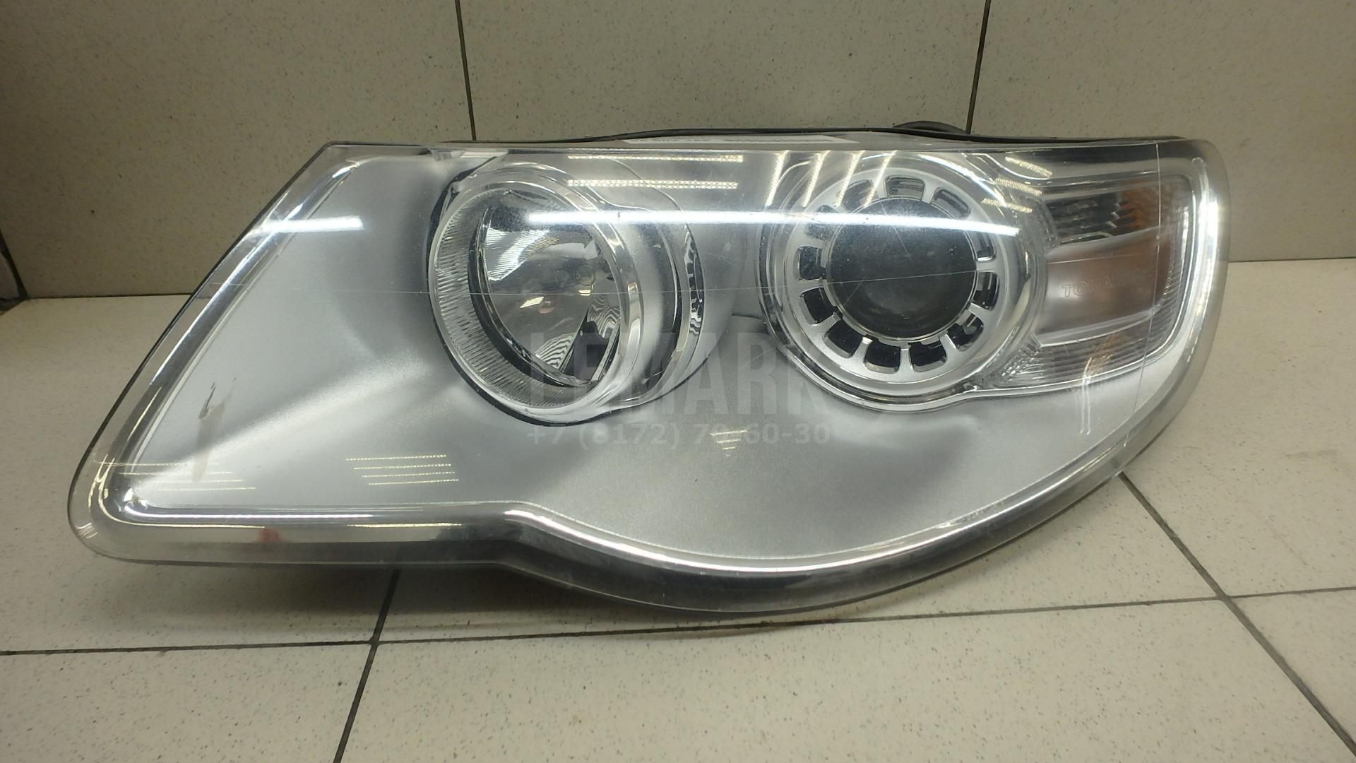 Фара левая 7L6941039A VAG