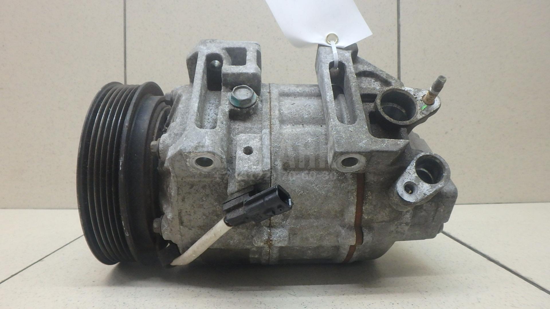 Компрессор кондиционера 92600ET82A Nissan