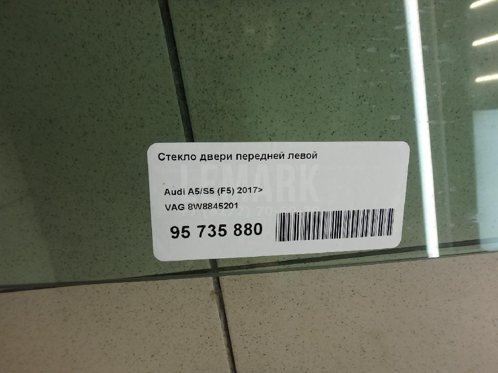 Стекло двери передней левой
