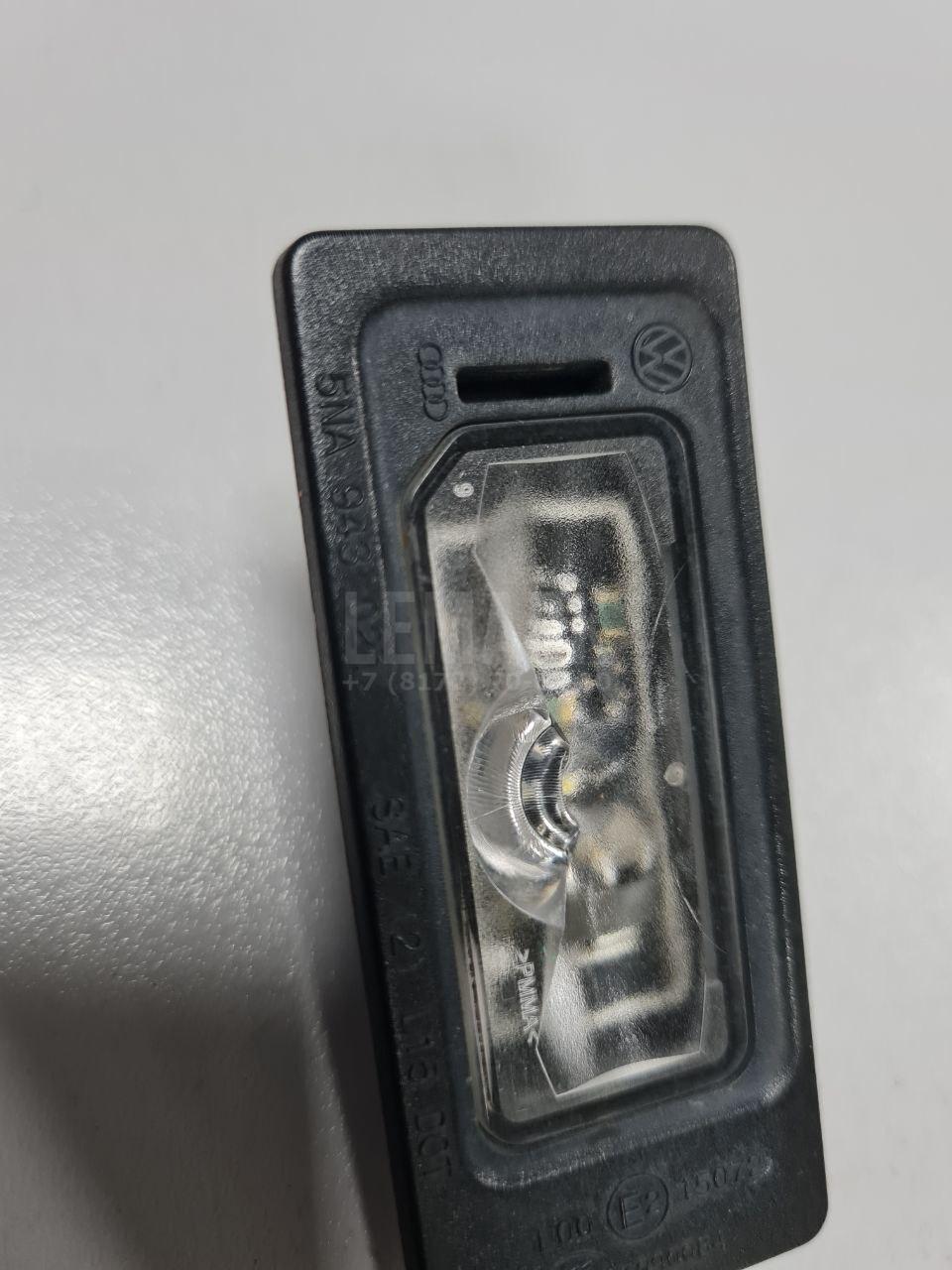 Фонарь подсветки номера для  Cadillac Escalade II 2000-2006