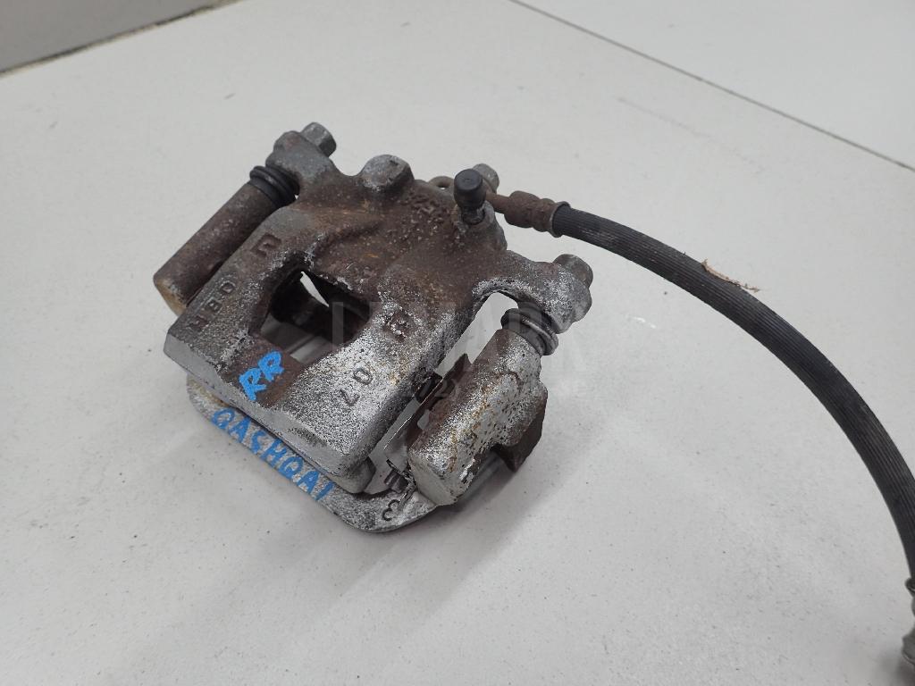 Суппорт тормозной задний правый 440011KD0A Nissan