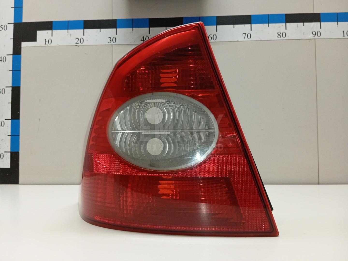 Фонарь задний левый 1333834 Ford