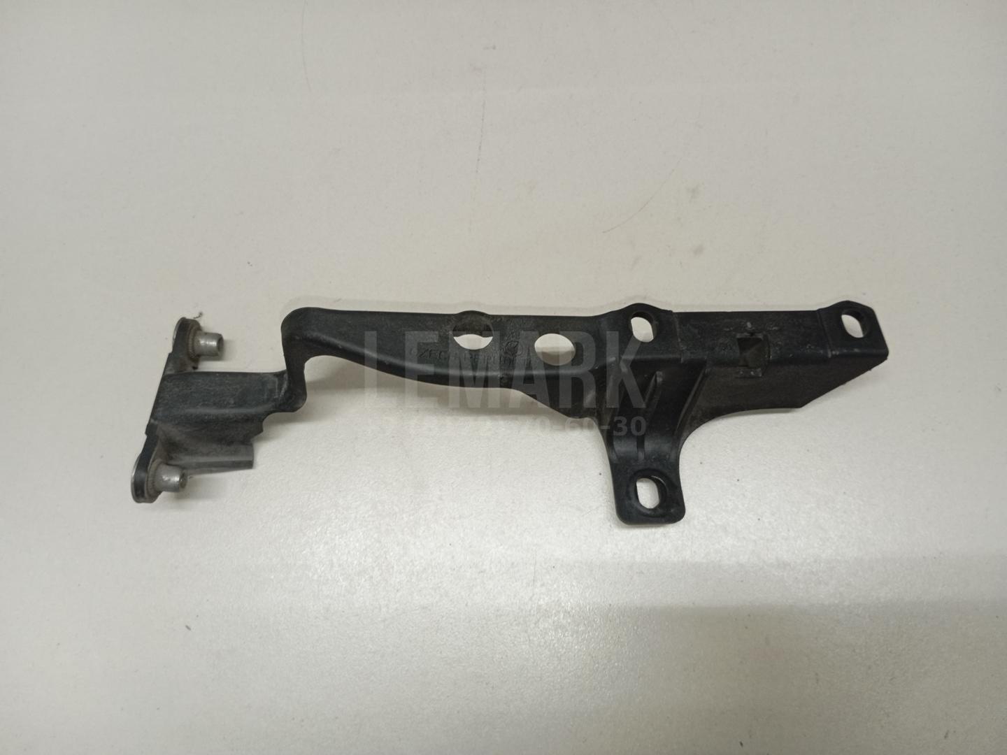 Кронштейн фар правый 7L0805734 VAG