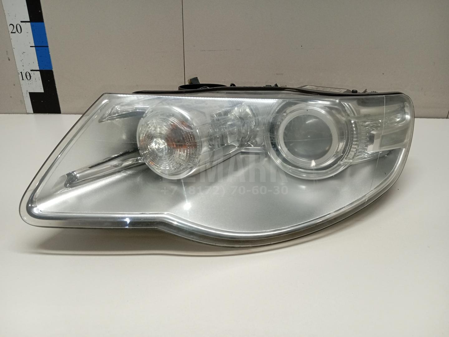 Фара левая 7L6941039D VAG