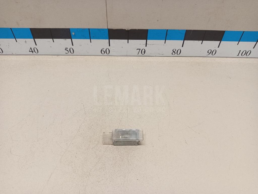 Фонарь подсветки двери 6L0947565 VAG