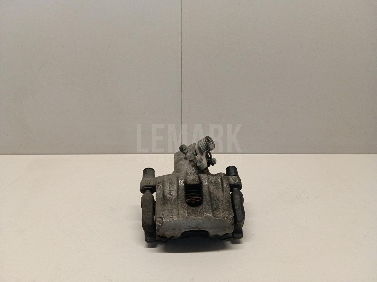 Суппорт тормозной задний правый 2210213 Ford