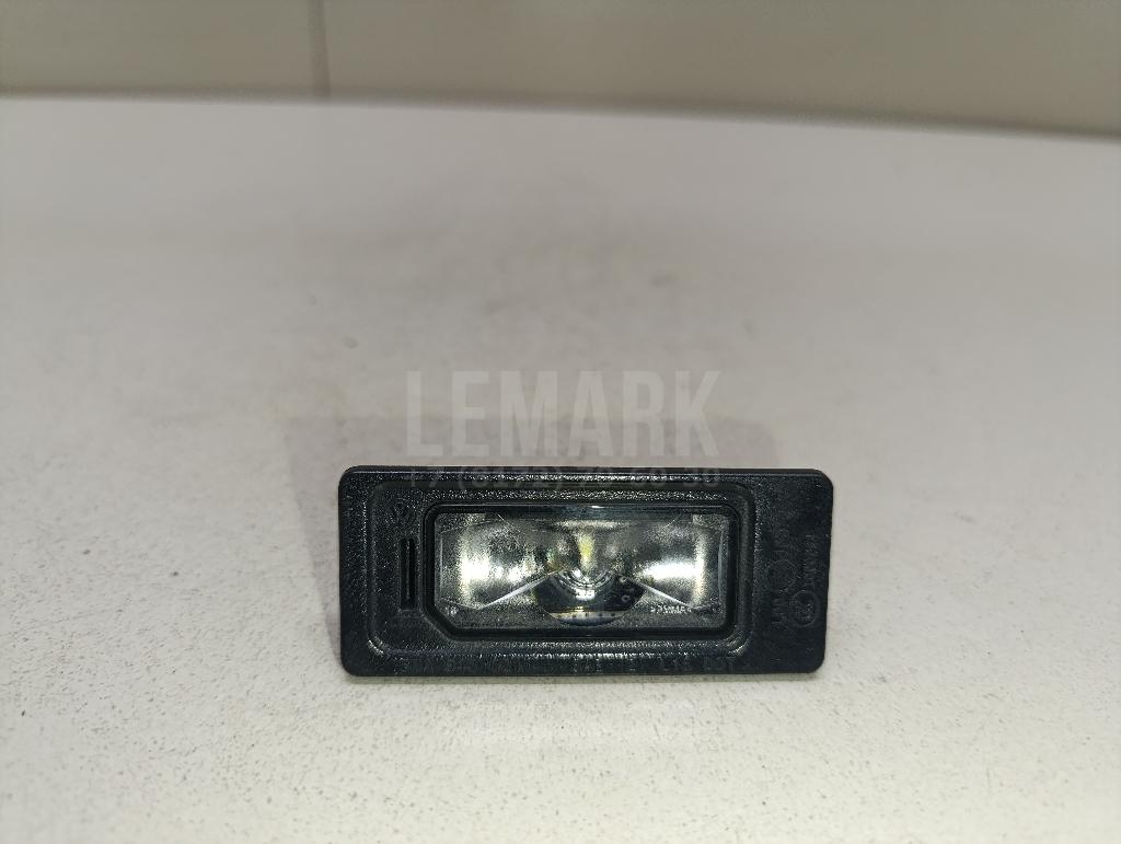 Фонарь подсветки номера 5NA943021 VAG