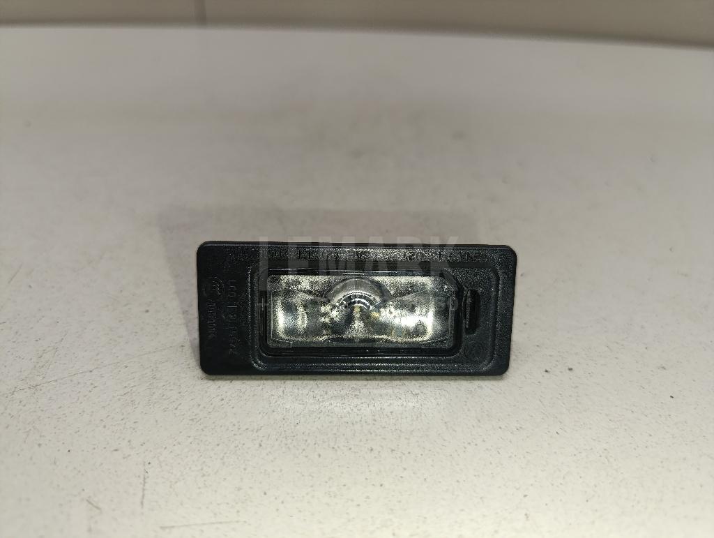 Фонарь подсветки номера 5NA943021 VAG