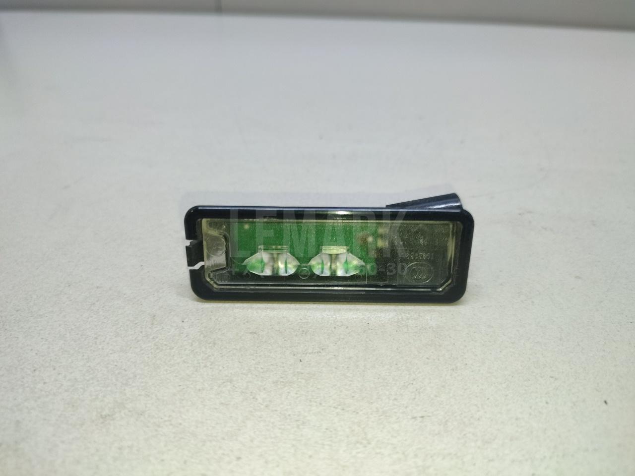 Фонарь подсветки номера 1K8943021C VAG