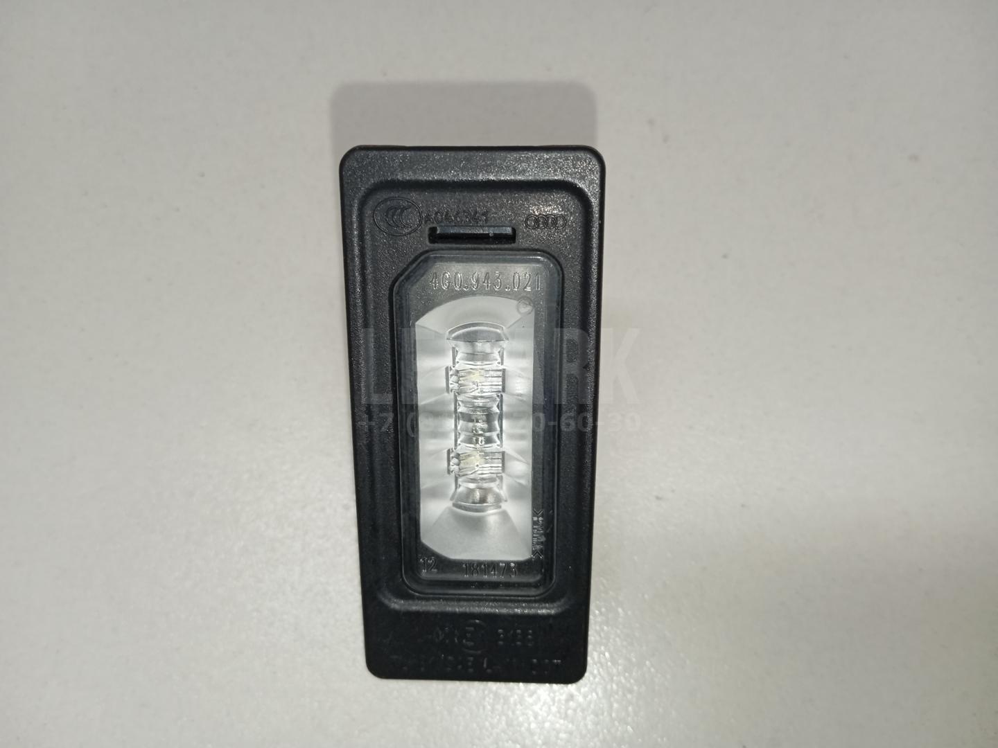 Фонарь подсветки номера для  BMW 1-serie E82/E88 2007-2013