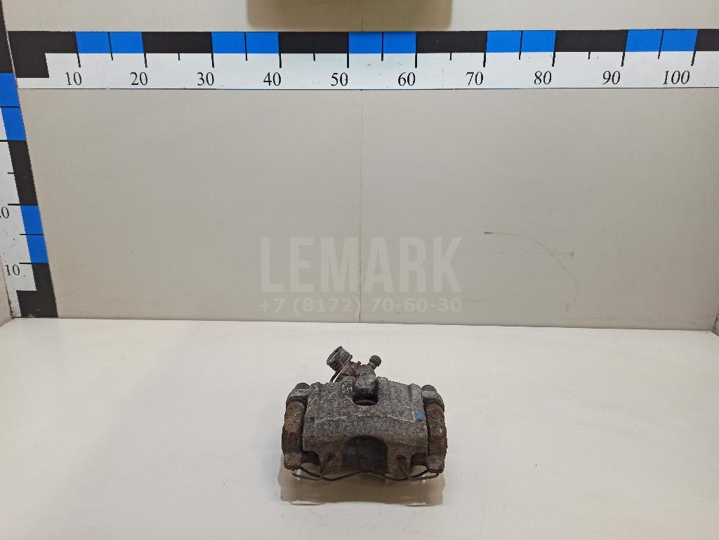 Суппорт тормозной задний левый 1761756 Ford