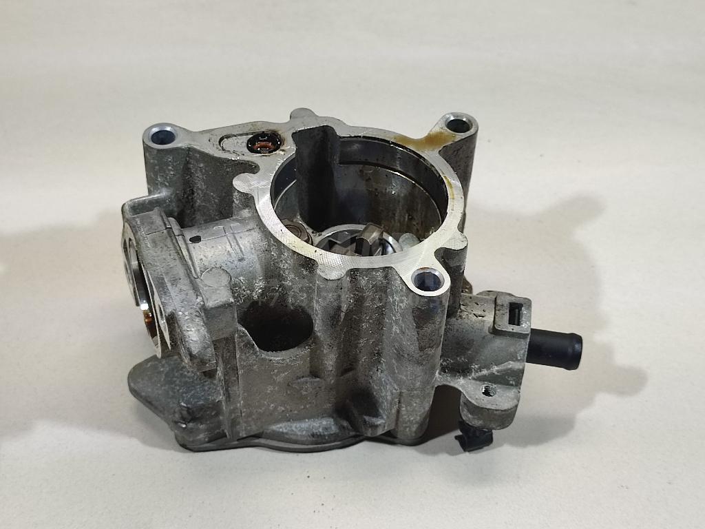 Насос вакуумный 06J145100G VAG