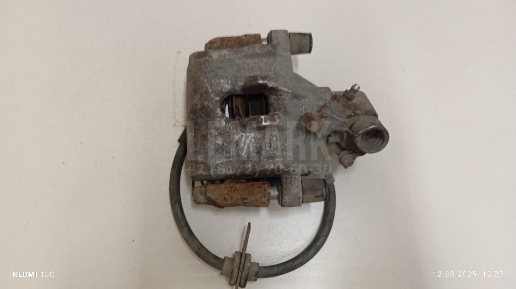 Суппорт тормозной задний правый 1761755 Ford