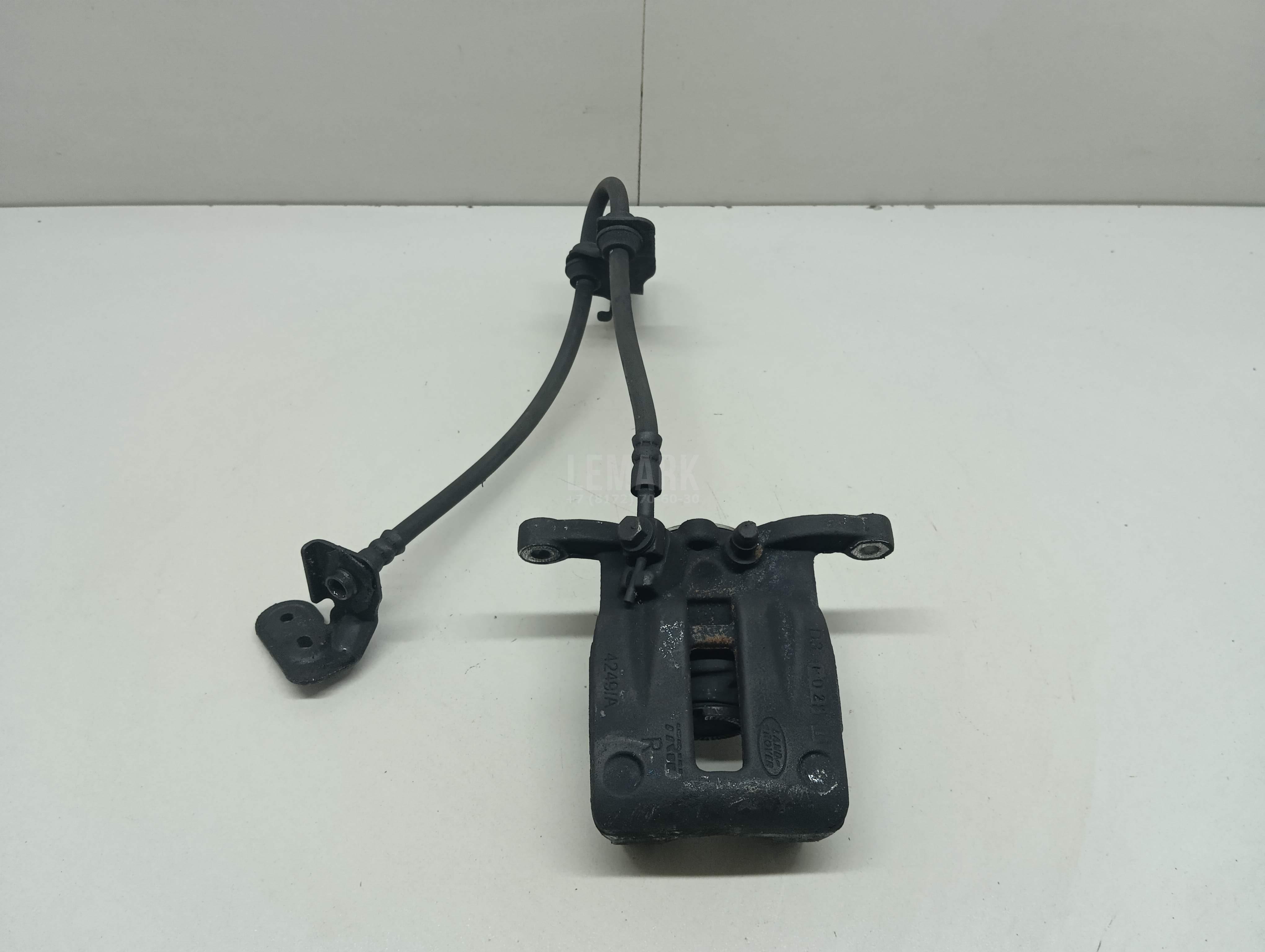 Суппорт тормозной задний правый LR043282 Land Rover