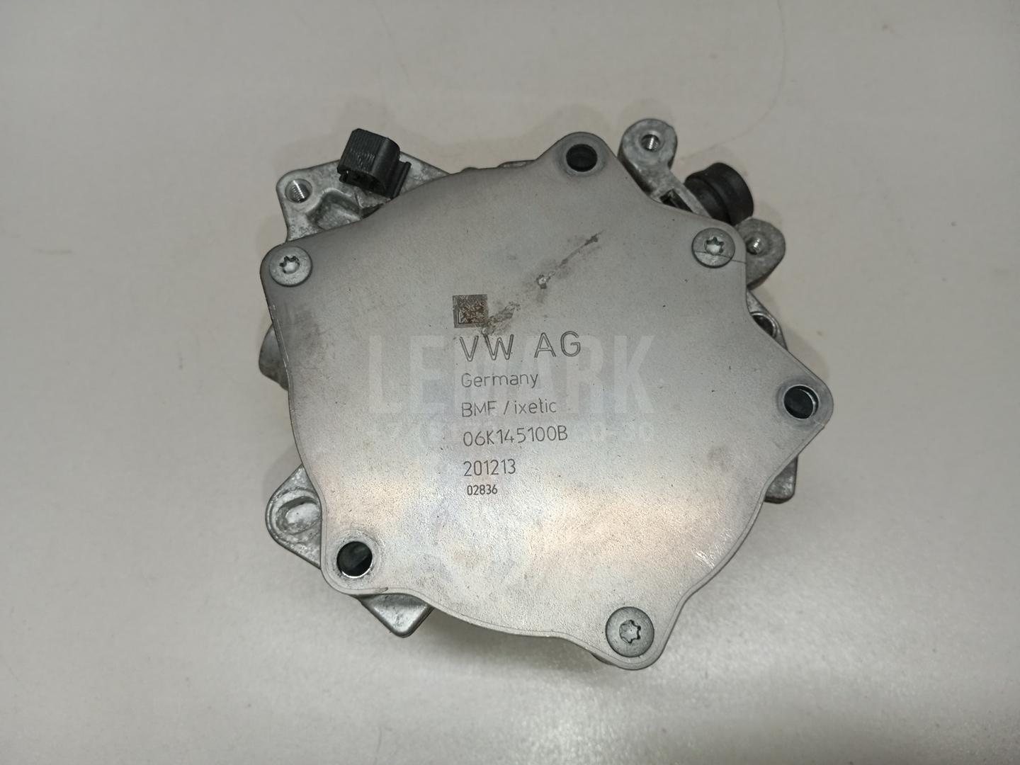 Насос вакуумный 06K145100B VAG