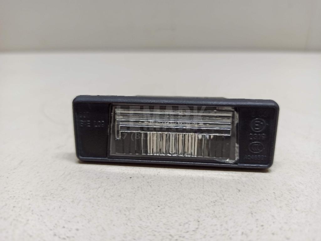 Фонарь подсветки номера 265108990A Nissan