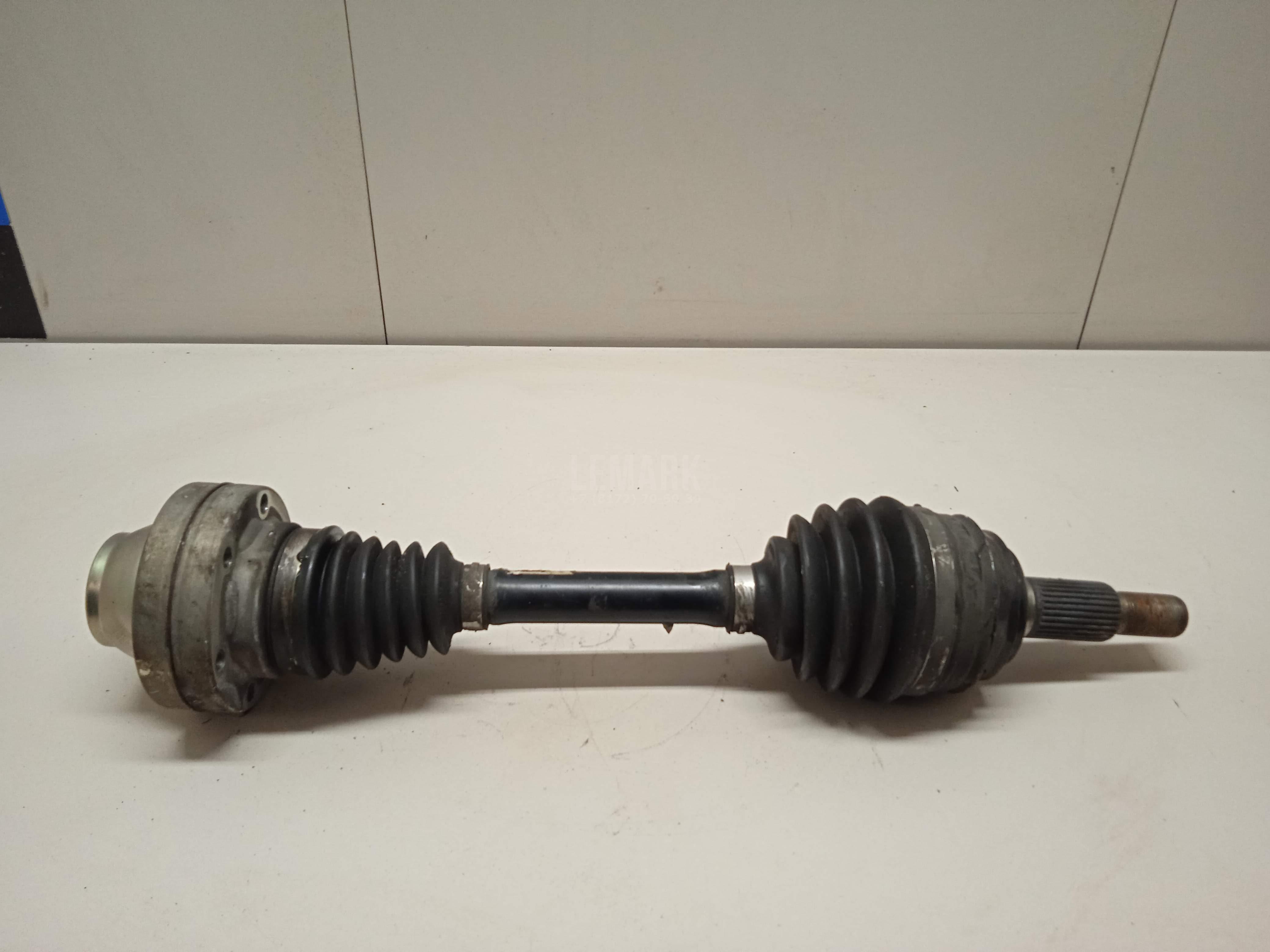 Полуось передняя 7P0407271C VAG