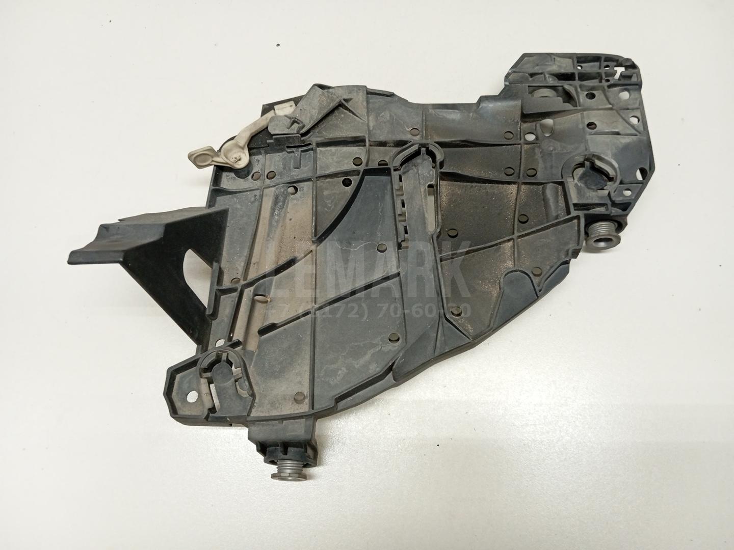 Кронштейн фар левый 7L6941291 VAG