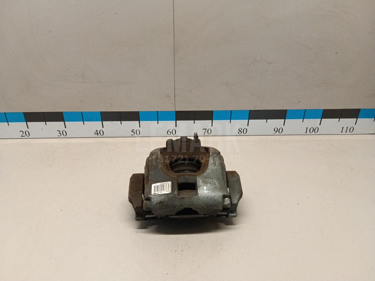 Суппорт тормозной передний левый 5181342 Ford