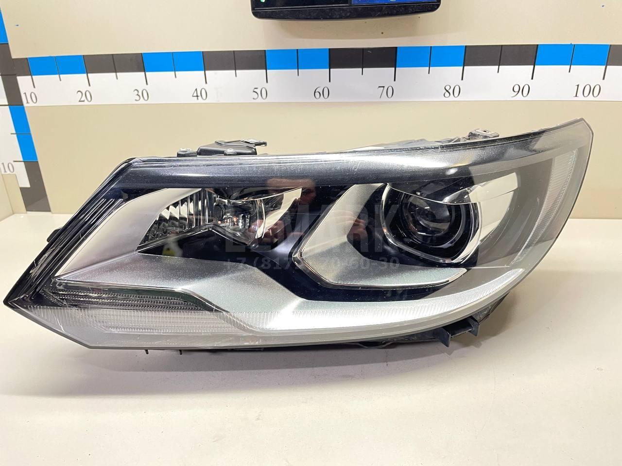 Фара левая 5ND941039B VAG
