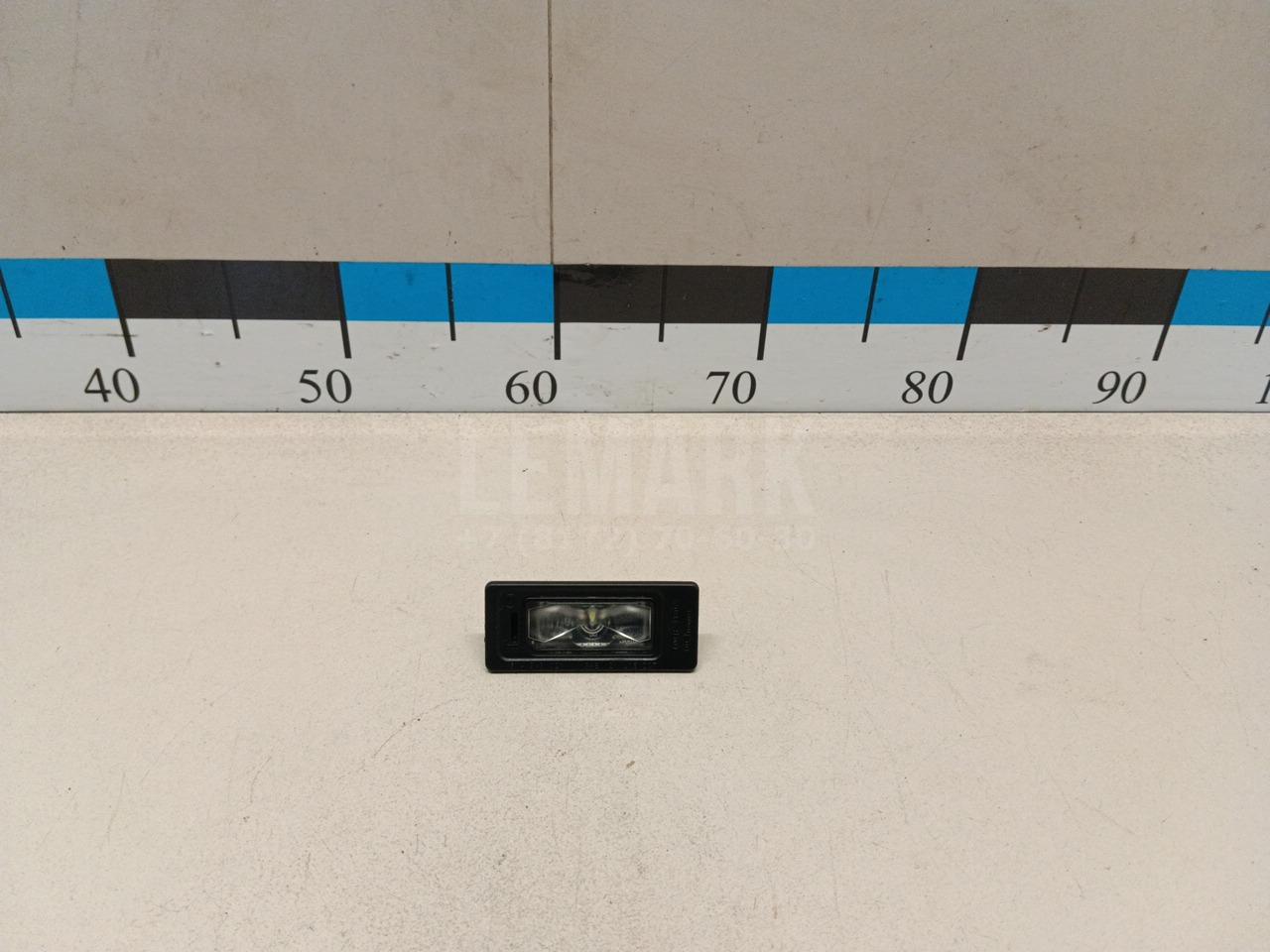 Фонарь подсветки номера 5NA943021 VAG