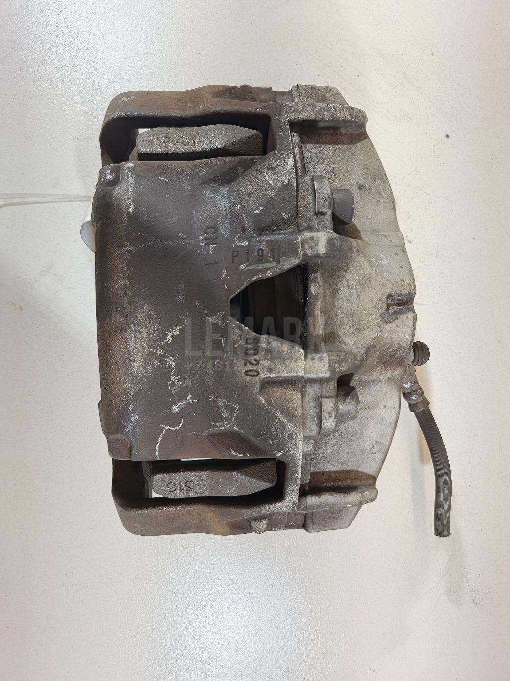 Суппорт тормозной передний левый 1435002 Ford