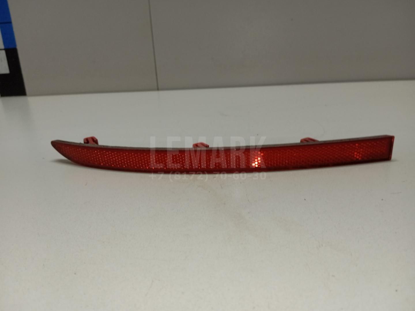 Отражатель в бампер задний левый 5N0945105 VAG