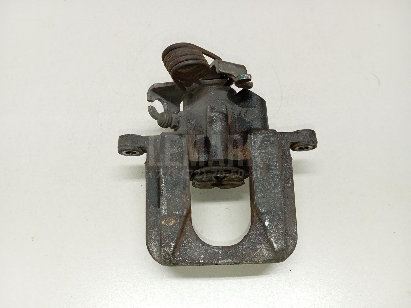 Суппорт тормозной задний левый FB5Z2553A Ford