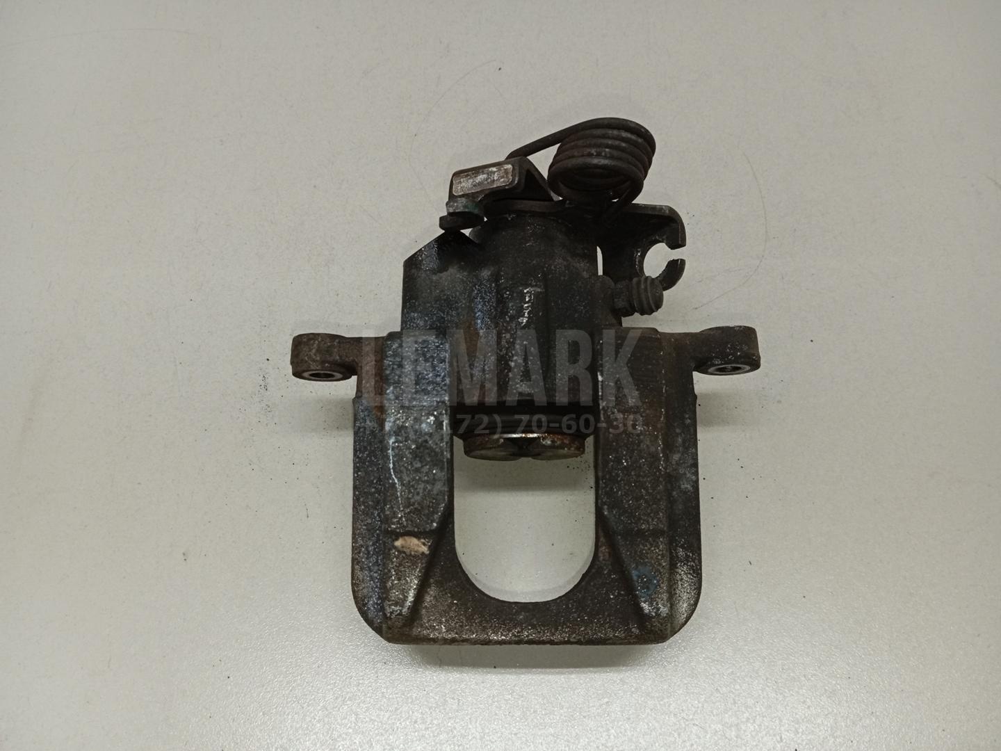 Суппорт тормозной задний правый FB5Z2552A Ford