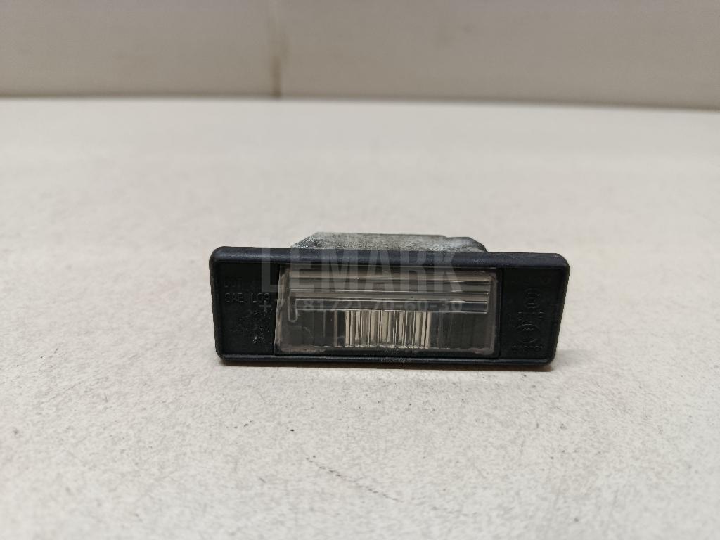 Фонарь подсветки номера 265108990A Nissan
