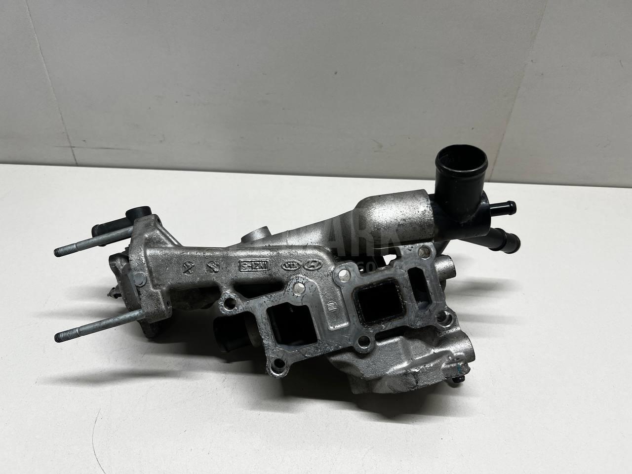 Корпус термостата 256102F690 Hyundai-Kia