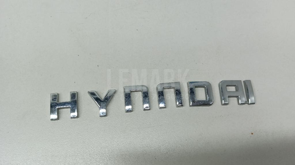 Эмблема на крышку багажника 863102B500 Hyundai-Kia