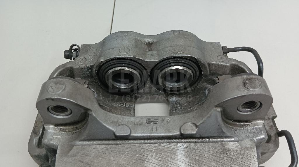 Суппорт тормозной передний левый для  Audi V8 1988-1994