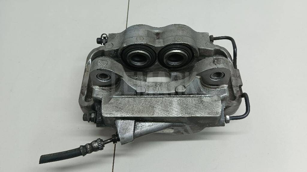 Суппорт тормозной передний левый для  Audi V8 1988-1994