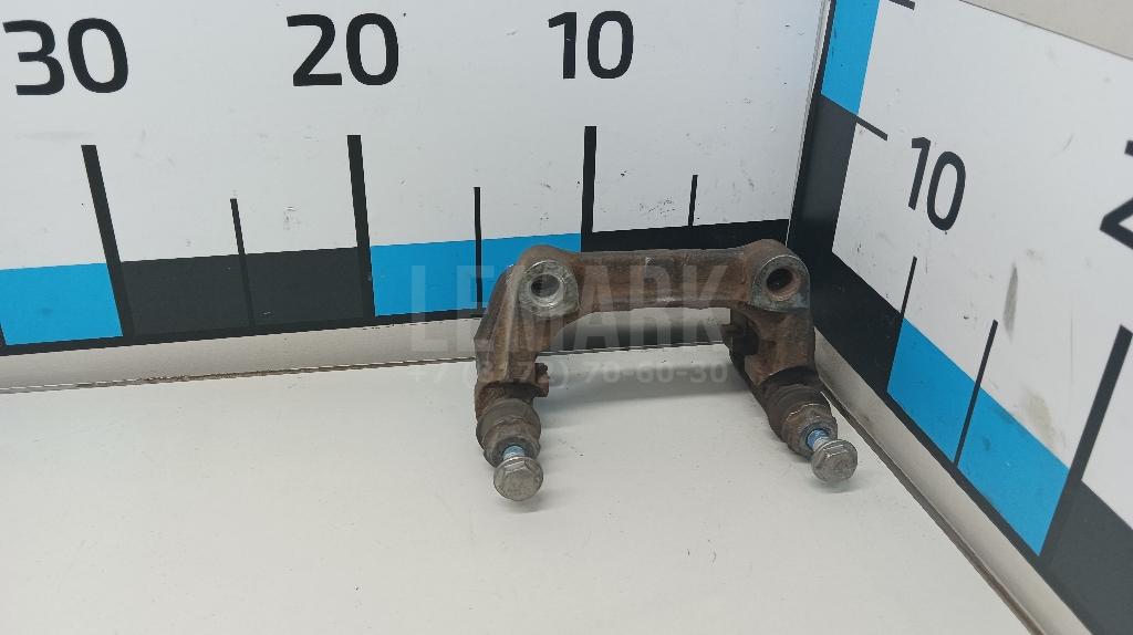 Скоба суппорта заднего 546389 GM
