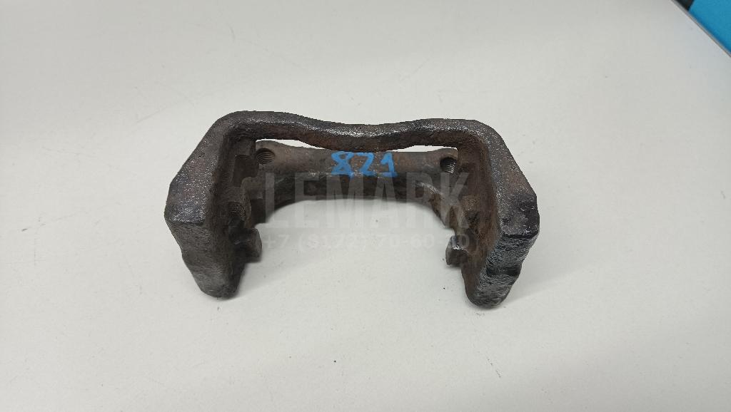 Скоба суппорта заднего 546389 GM