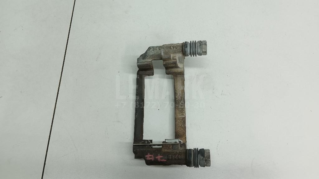 Скоба суппорта заднего 546065 GM
