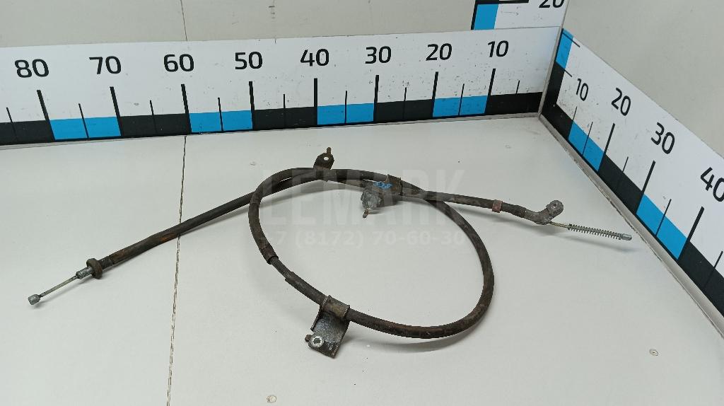 Трос стояночного тормоза левый 36531JD00A Nissan