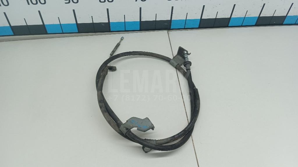 Трос стояночного тормоза левый 36531JG00A Nissan