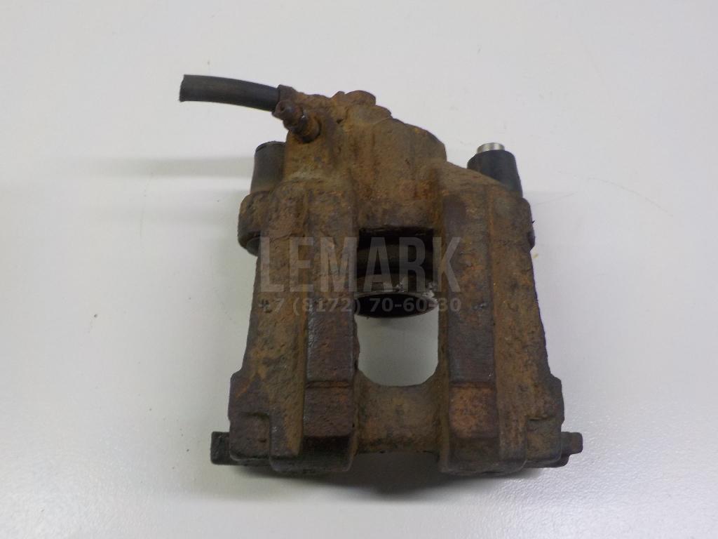 Суппорт тормозной задний левый 4682841 Ford