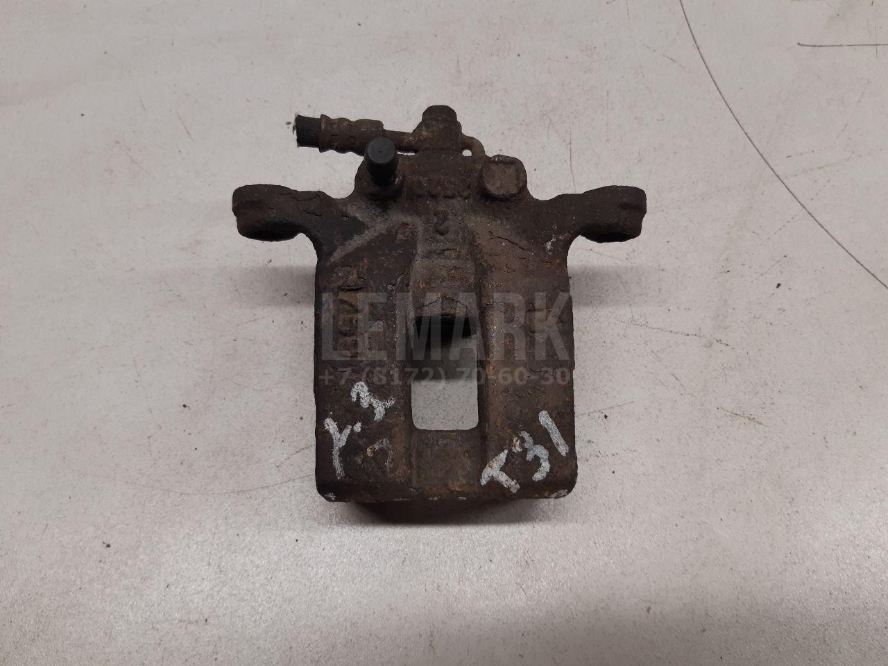 Суппорт тормозной задний левый 44011JG00A Nissan
