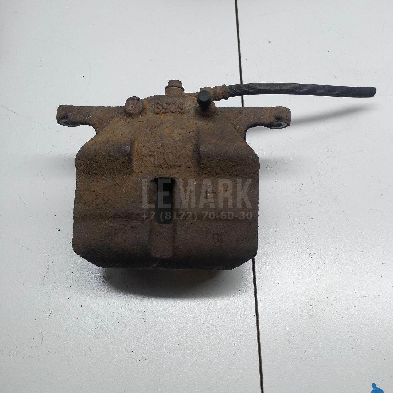 Суппорт тормозной передний левый 41011JD00A Nissan