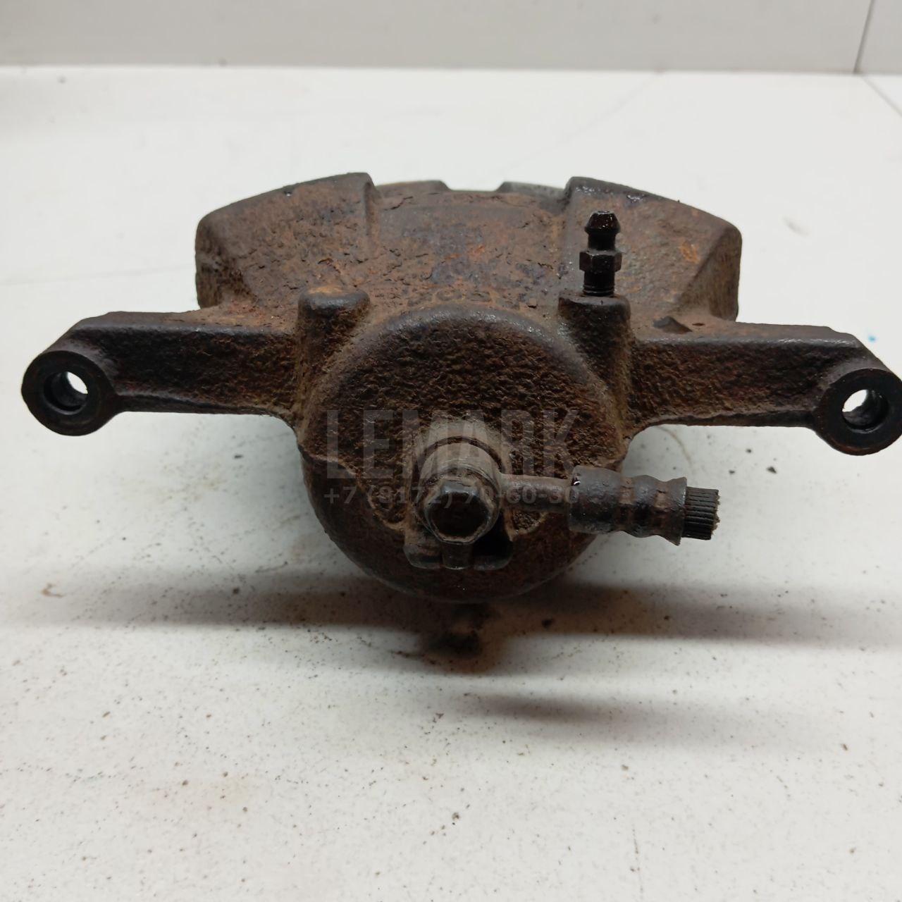 Суппорт тормозной передний правый 41001JD00A Nissan